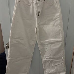 The brand is banana and the color is white